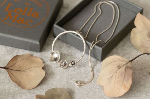 sterling silver floral hoop pendant