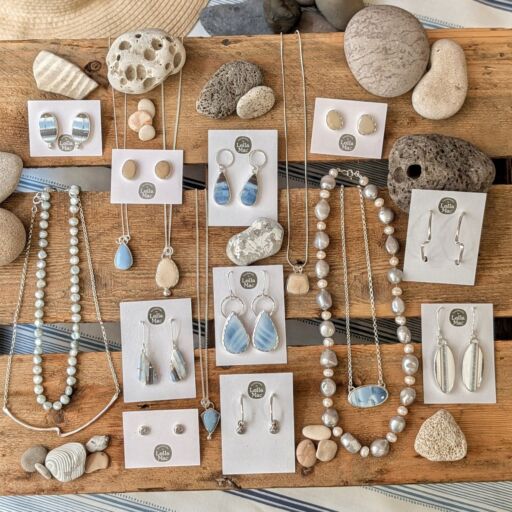 summer inspired jewellery featuring beach pebbles and sea blue gemstones set in sterling silver